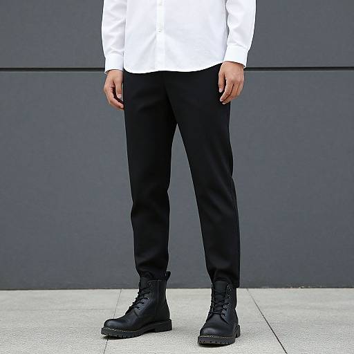 Man in White Shirt and Black Pants