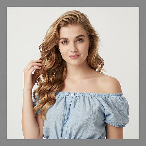 Portrait of Blonde Woman in Light Blue Blouse