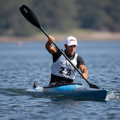 Photograph of a male paddleboarder in a white vest with 