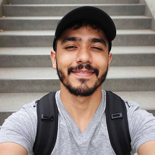 Smiling man taking selfie outdoors