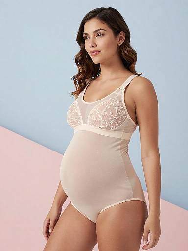 Pregnant Woman in Ivory Maternity Lingerie