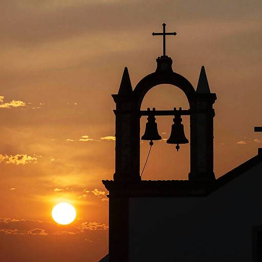 Silhouetted Church Bell Tower at Sunset