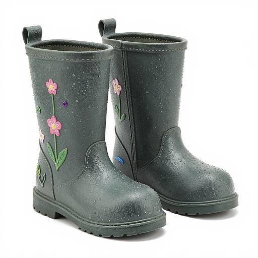 Photograph of black rubber children's rain boots with colorful embroidered flowers, water droplets, and blue and purple accent beads.