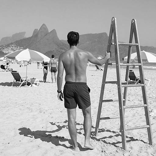 Shirtless Man Standing by Ladder on Beach