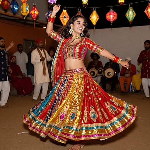 Photograph of a smiling Indian woman dancing in a vibrant, gold and red traditional lehenga with colorful embroidery, surrounded by musicians in a decorated, festive