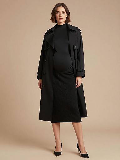 Sleek Monochrome Maternity Fashion Portrait