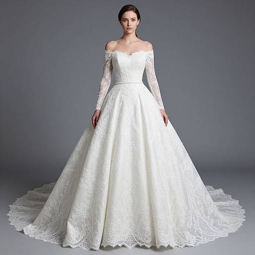 Photograph of a fair-skinned woman with dark hair in an off-the-shoulder, long-sleeve white lace wedding gown with a full