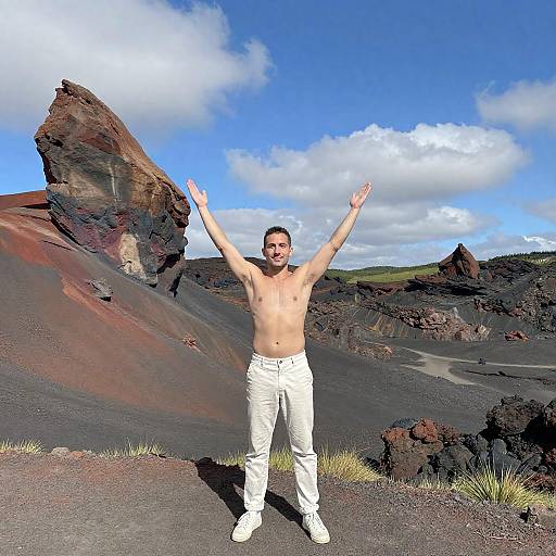 Joyful Man Among Vibrant Volcanic Landscape