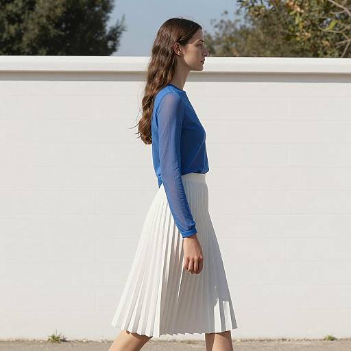 Elegant Woman in Sheer Blue Ensemble
