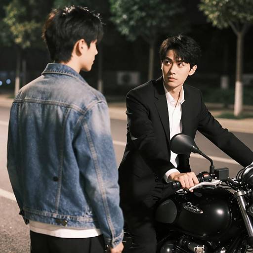 Nighttime Conversation by Motorcycle