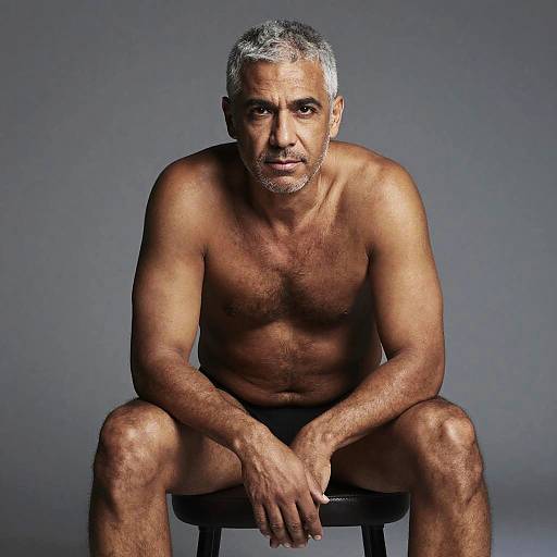 Portrait of Seated Medium-Dark-Skinned Man