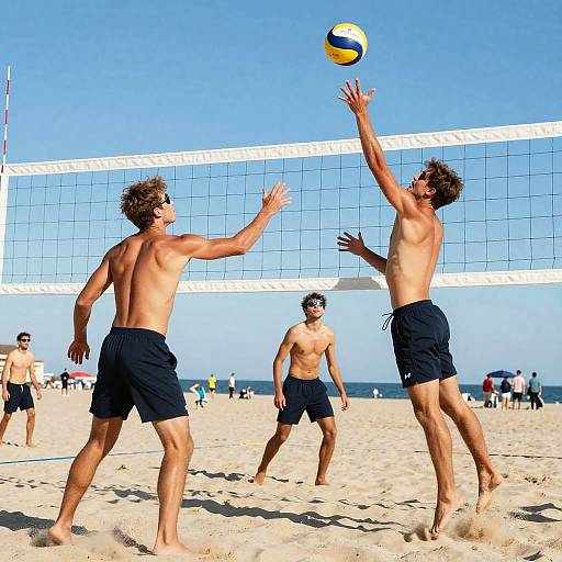Shirtless College Men Playing Beach Volleyball