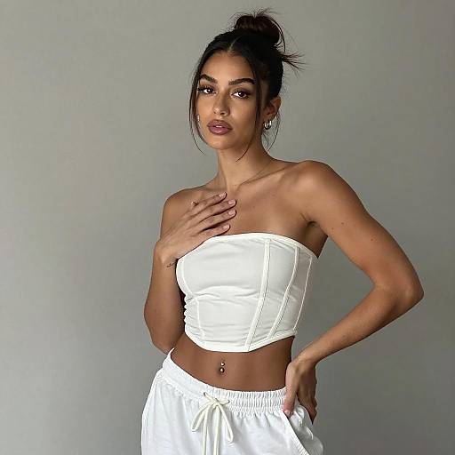 Young Woman in White Corset Outfit