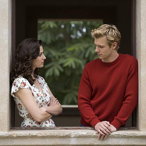 Couple Leaning Out of Window
