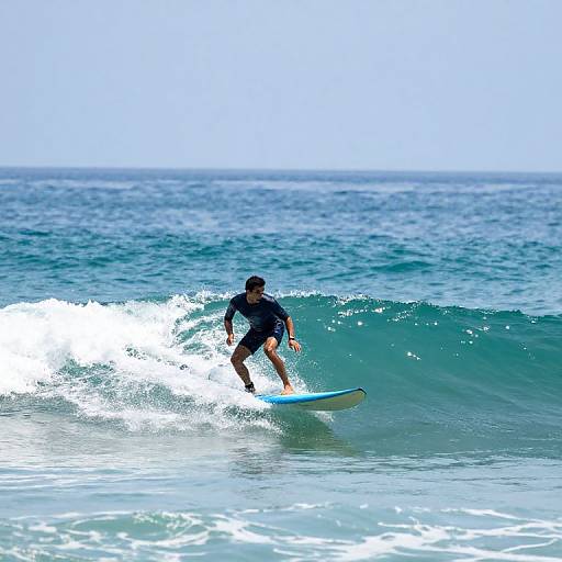 Surfer on Turquoise Wave