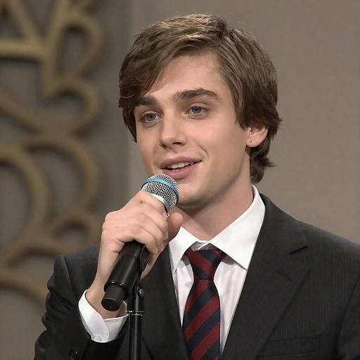 Young Man in Pinstripe Suit Speaking