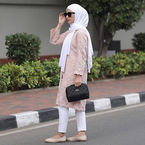 Woman in White Hijab with Purse