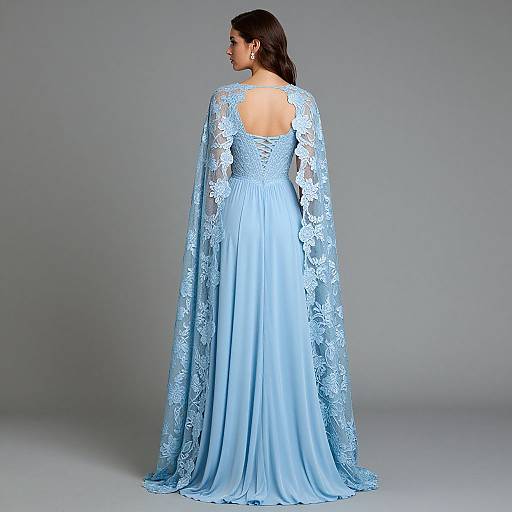 Photograph of a woman with long dark hair wearing a floor-length, light blue lace gown with long sleeves, viewed from the back against a plain gray