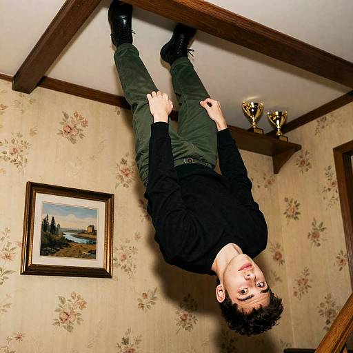 Young Man Upside Down in Floral Decor