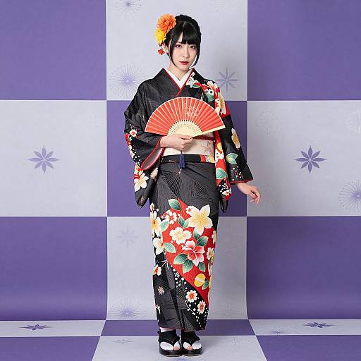 Asian Woman in Traditional Japanese Kimono with Red Fan