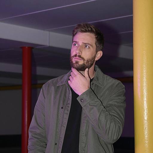 Man in Green Jacket with Purple Lighting