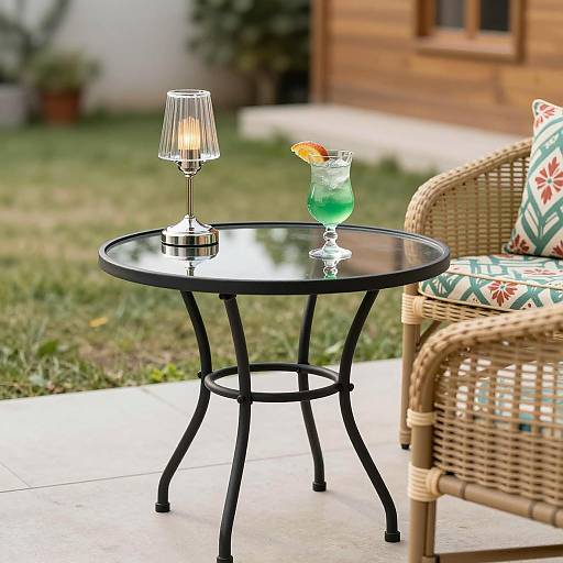 Patio Glass Table with Green Cocktail and Lamp