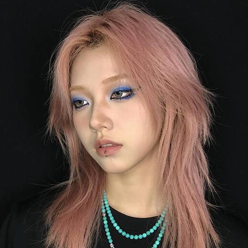 Young Woman with Pink Hair and Blue Eyeliner