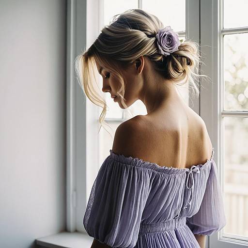 Woman in Lavender Off-Shoulder Dress with Floral Hair Accessory