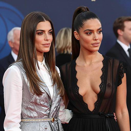 Two Women in Fashionable Attire at Event