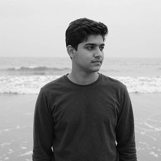 Young Man on Beach in Black and White