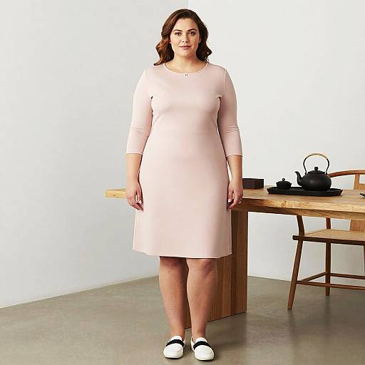 Lanky Woman in Minimalist Blush Dress