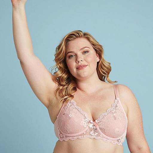 Plus-Size Woman in Pink Lace Bra Raising Arm