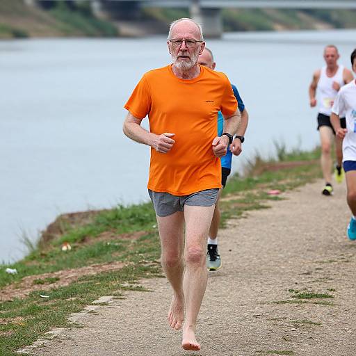 Elderly Runner by Riverside Path