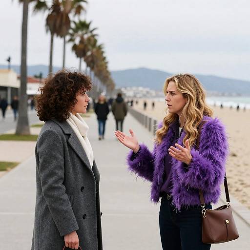 Women Conversing on a Beach Boardwalk