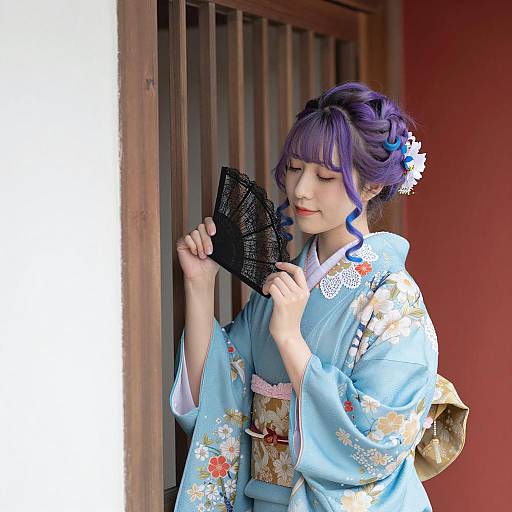 Elegant Woman in Blue Kimono Portrait