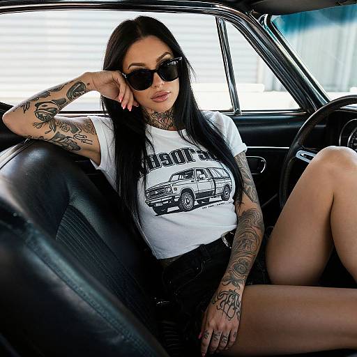Tattooed Woman in Leather Car