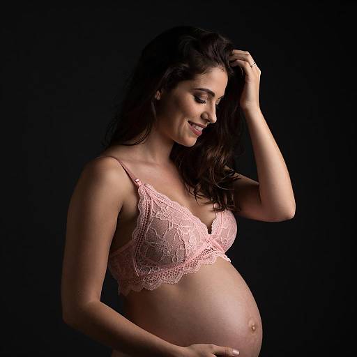 Pregnant Woman in Pink Lace Bra