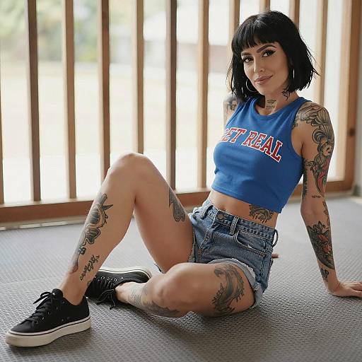 Tattooed Woman on Mesh Floor