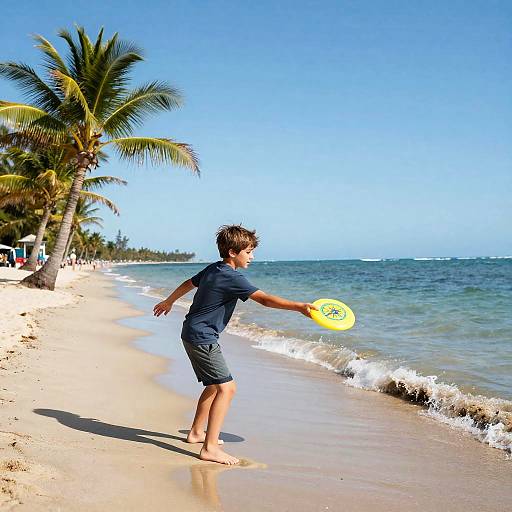Boy Playing Frisbee on Sunny Beach