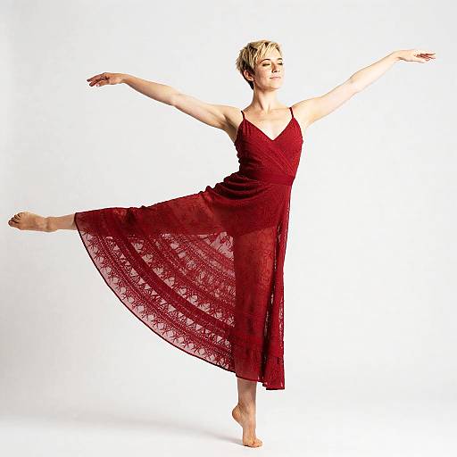 Graceful Woman in Red Dress Dancing