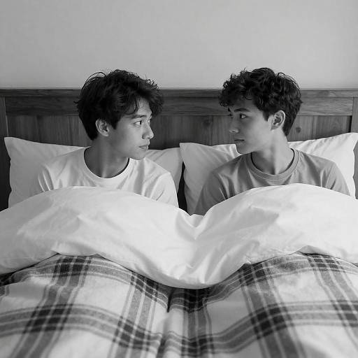 Black and White Portrait of Two Young Men in Bed