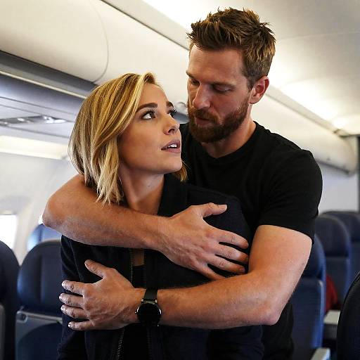 Intimate Moment in Airplane Cabin