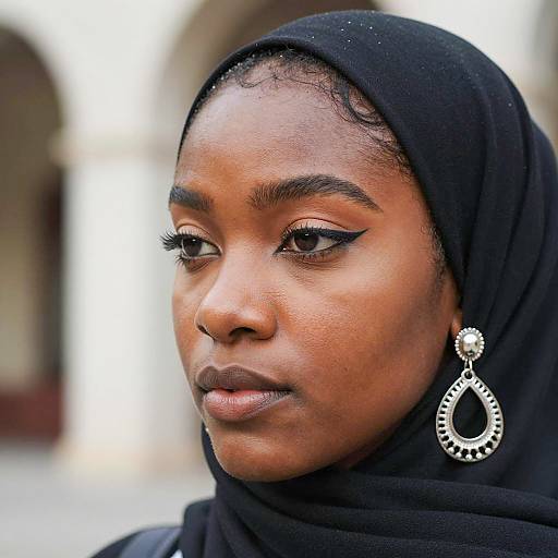 Portrait of Woman in Black Hijab with Silver Earring
