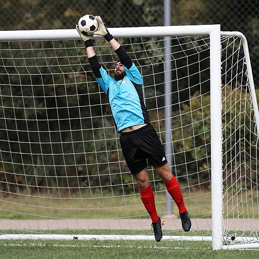 Dynamic Bearded Goalkeeper in Action