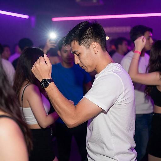 Vibrant Nightclub Scene with Dancing Crowd