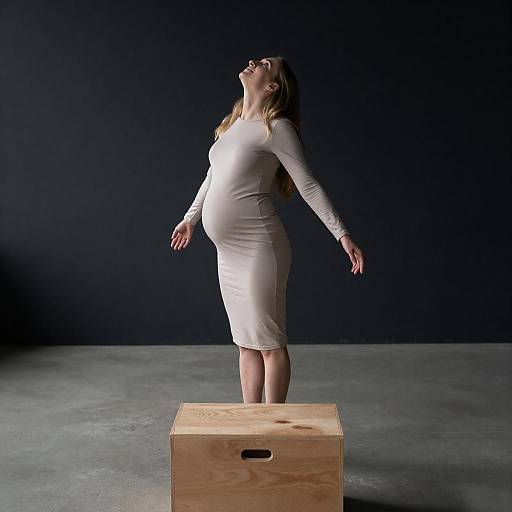 Serene Pregnant Woman in Beige Dress