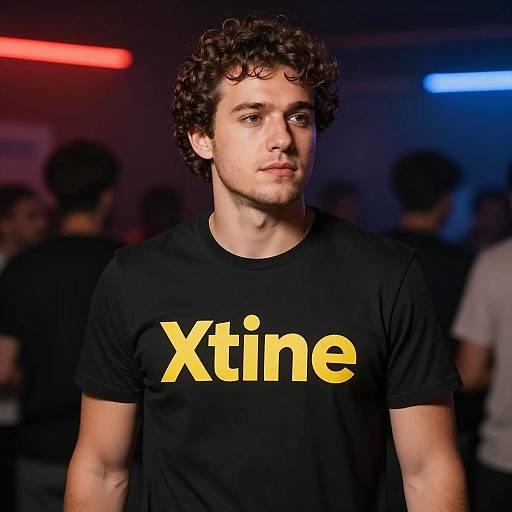 Young Man Wearing Xtine T-Shirt at Nightclub