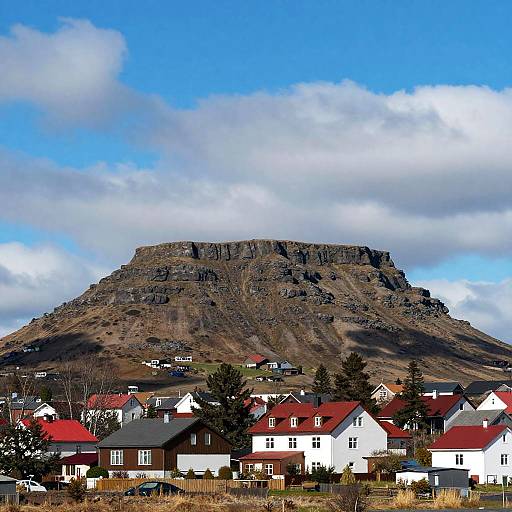 Small Town Beneath Flat-Topped Mountain