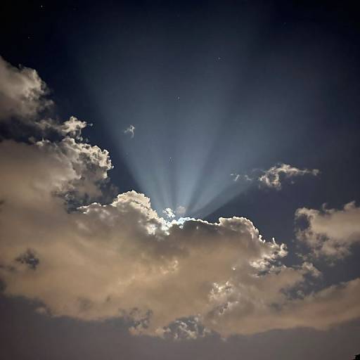 Radiant Beams Through Starry Clouds