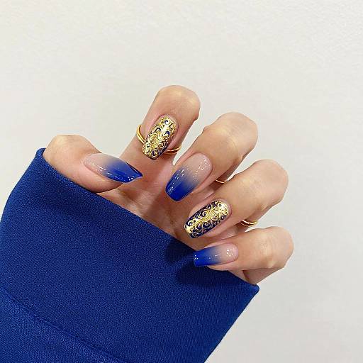 Elegant Gold and Royal Blue Nails